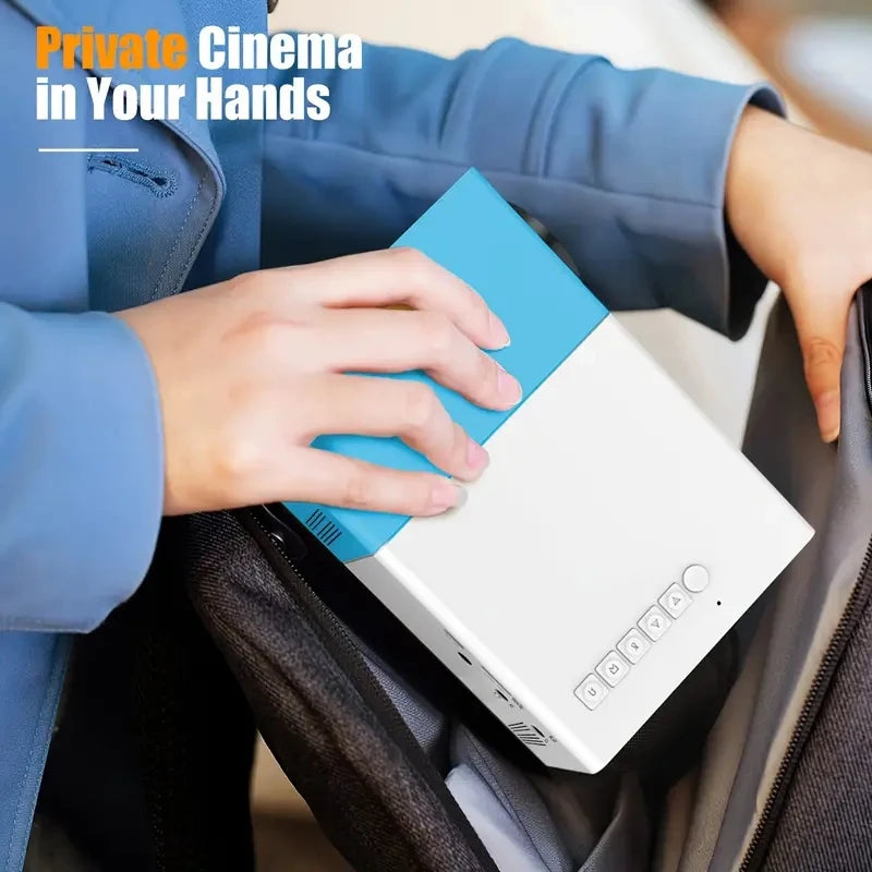 Mini vidéoprojecteur portable bleu et blanc, cinéma privé dans vos mains, gadget high-tech compact