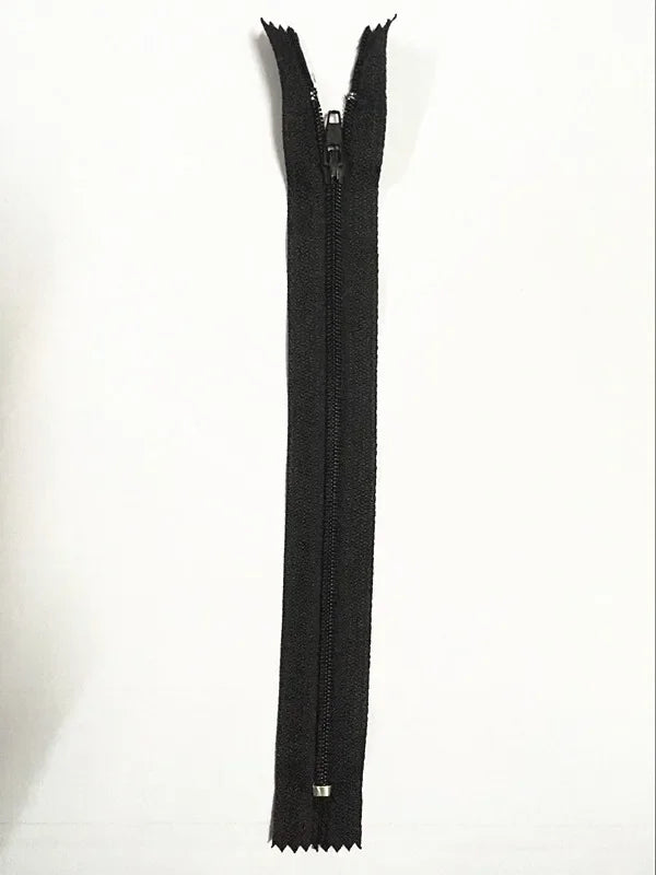 Fermeture éclair noire en tissu, zip métallique, idéale pour vêtements ou accessoires de couture
