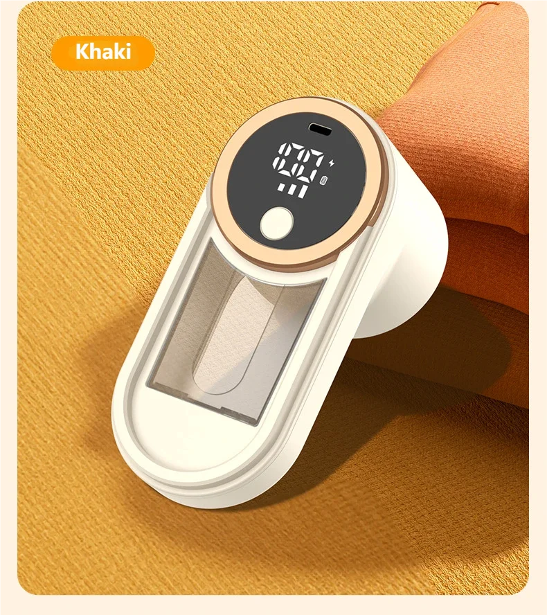 Gadget high-tech blanc et doré avec écran numérique, couleur khaki, sur tissu texturé